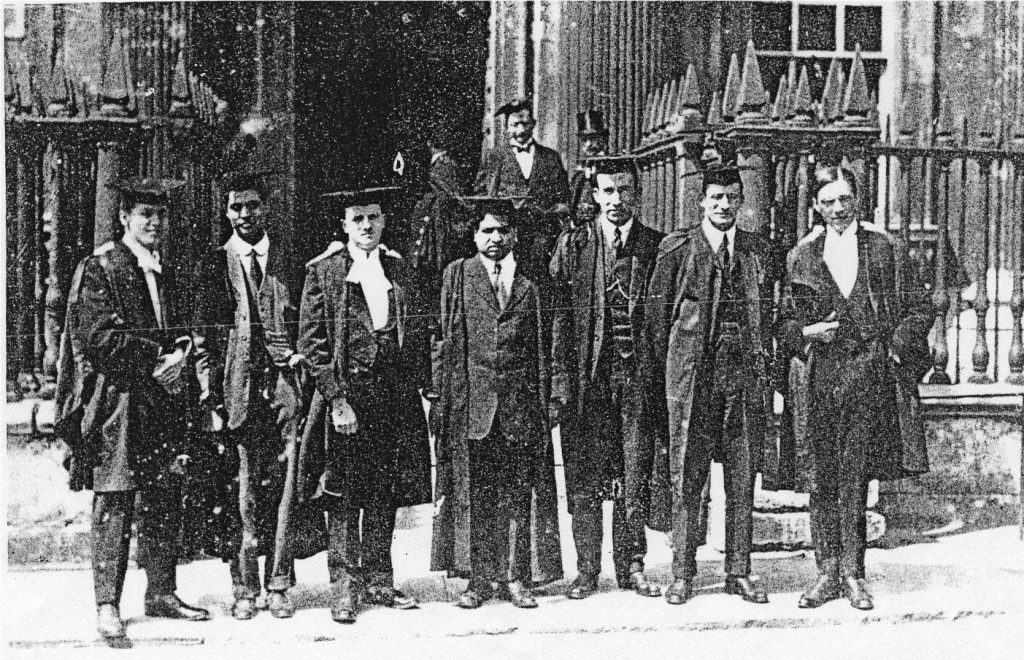 Ramanujan (centre) with other graduates at Trinity College in March 1916. 